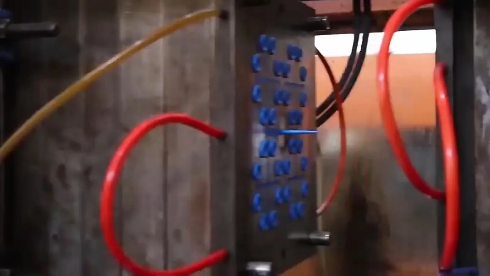 Color-coded drip tubing connectors and valves on a workbench