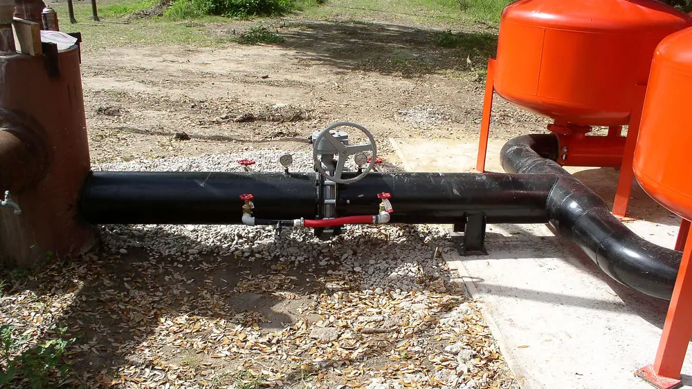 Sand media filter tanks installed at an irrigation head unit
